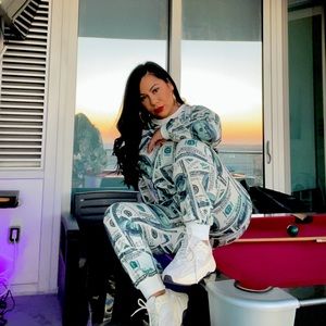 Two piece money jogger and sweater.